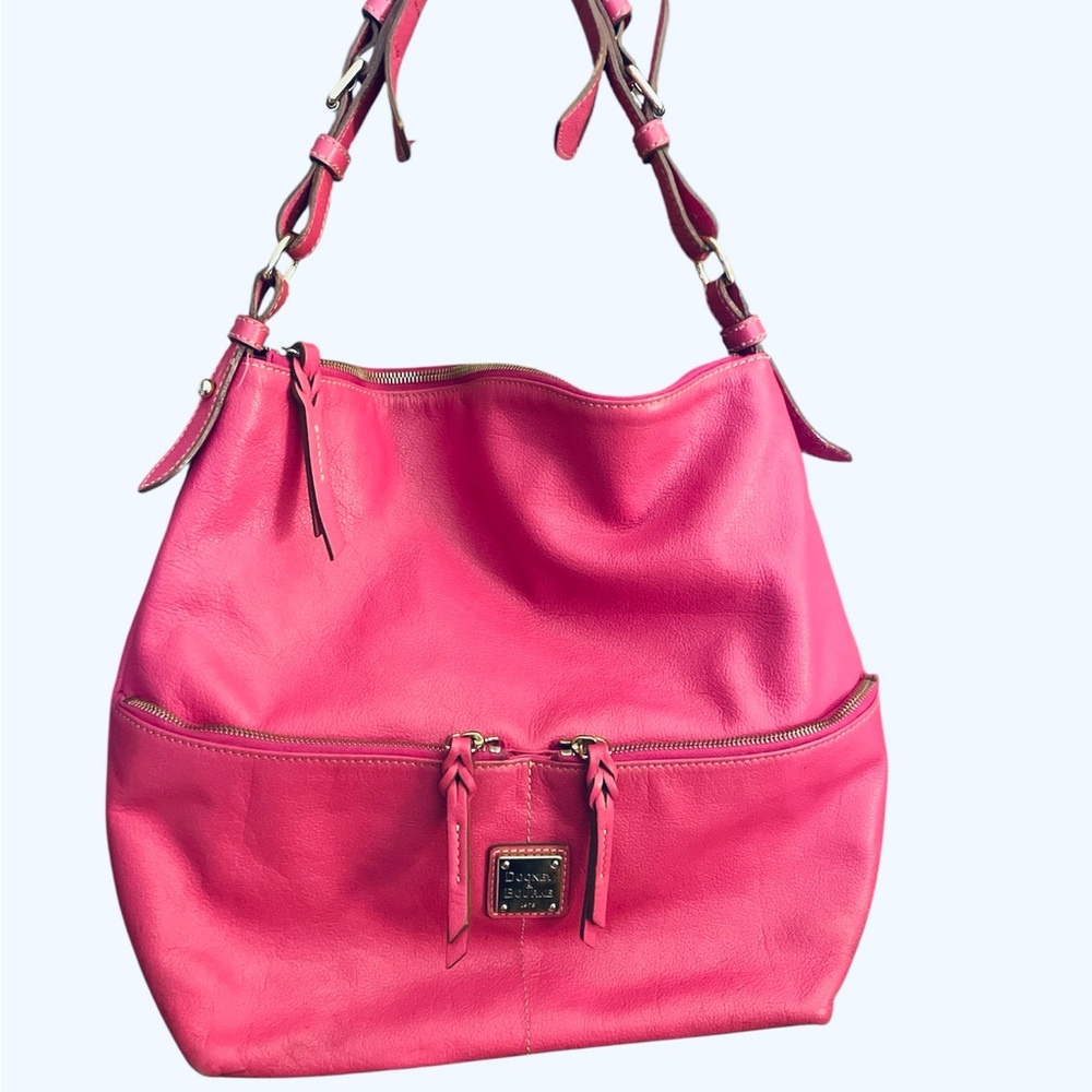 Dooney & Bourke Dillen pebbled leather hobo bag in a vibrant pink